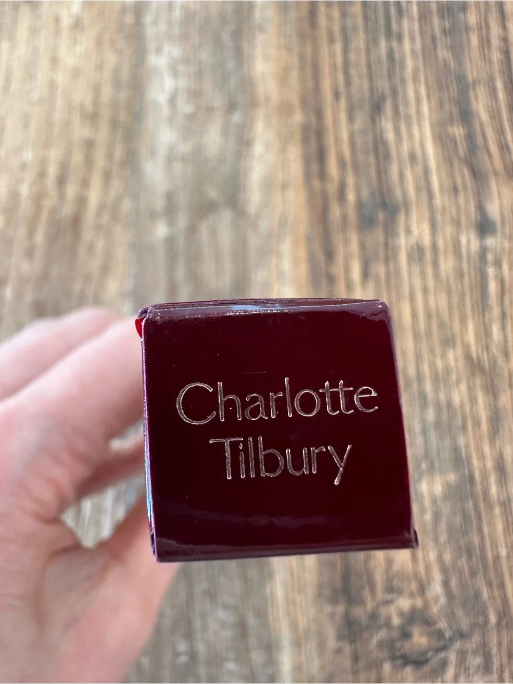 Charlotte Tilbury Liquid Concealer in Deep Burgundy Packaging